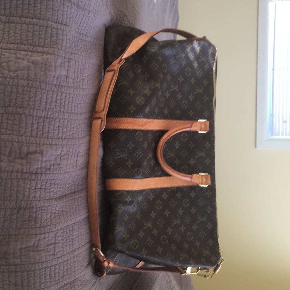 Louis Vuitton carry on luggage bag